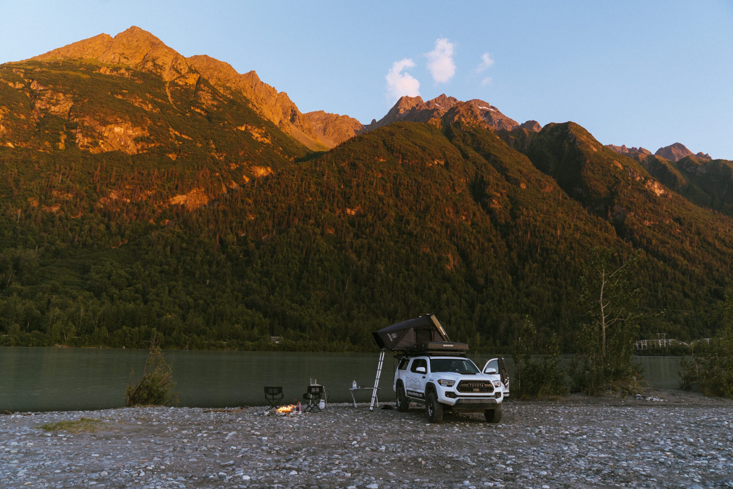 Summer Camping set up at sunset in Alaska along the Knik River