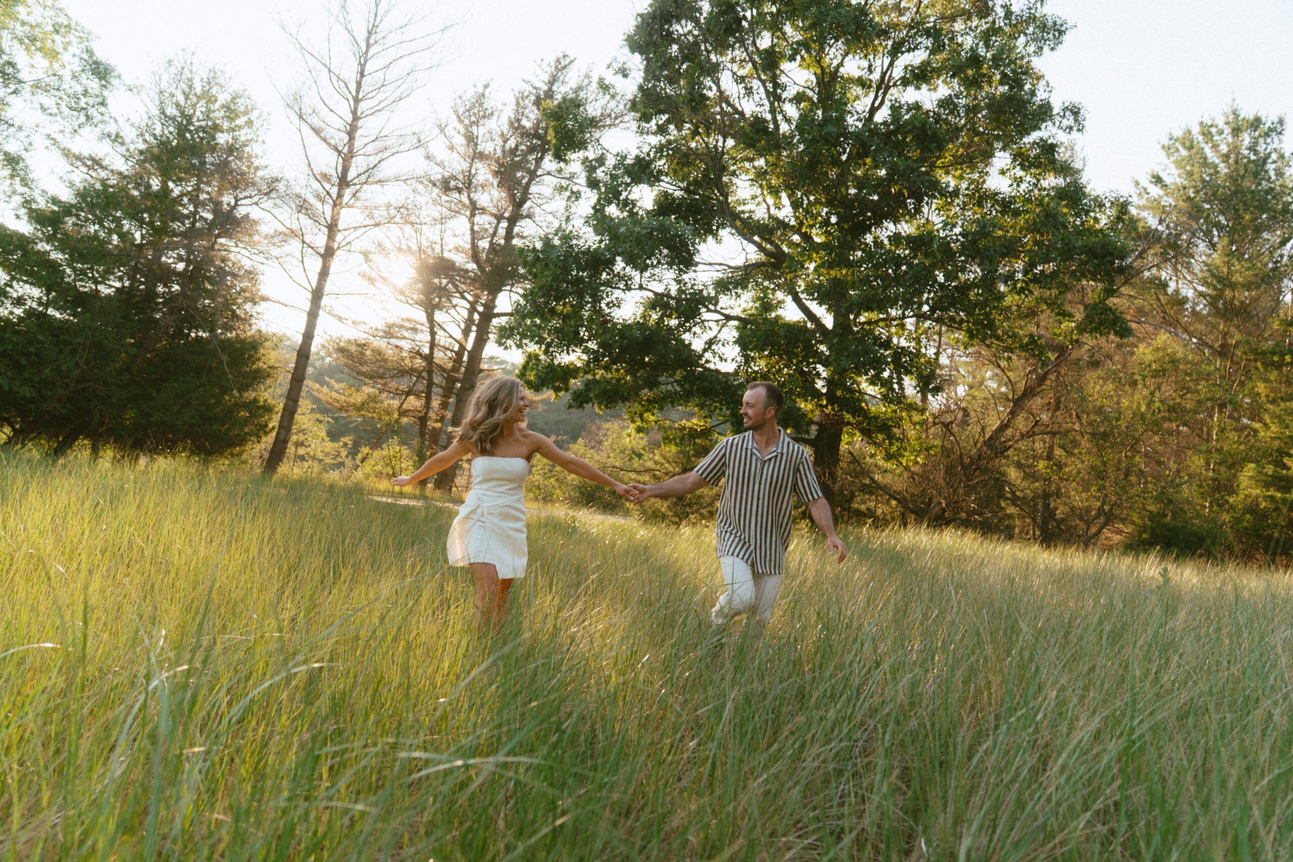 Engagement couple in Ludington State Park in Northern Michigan